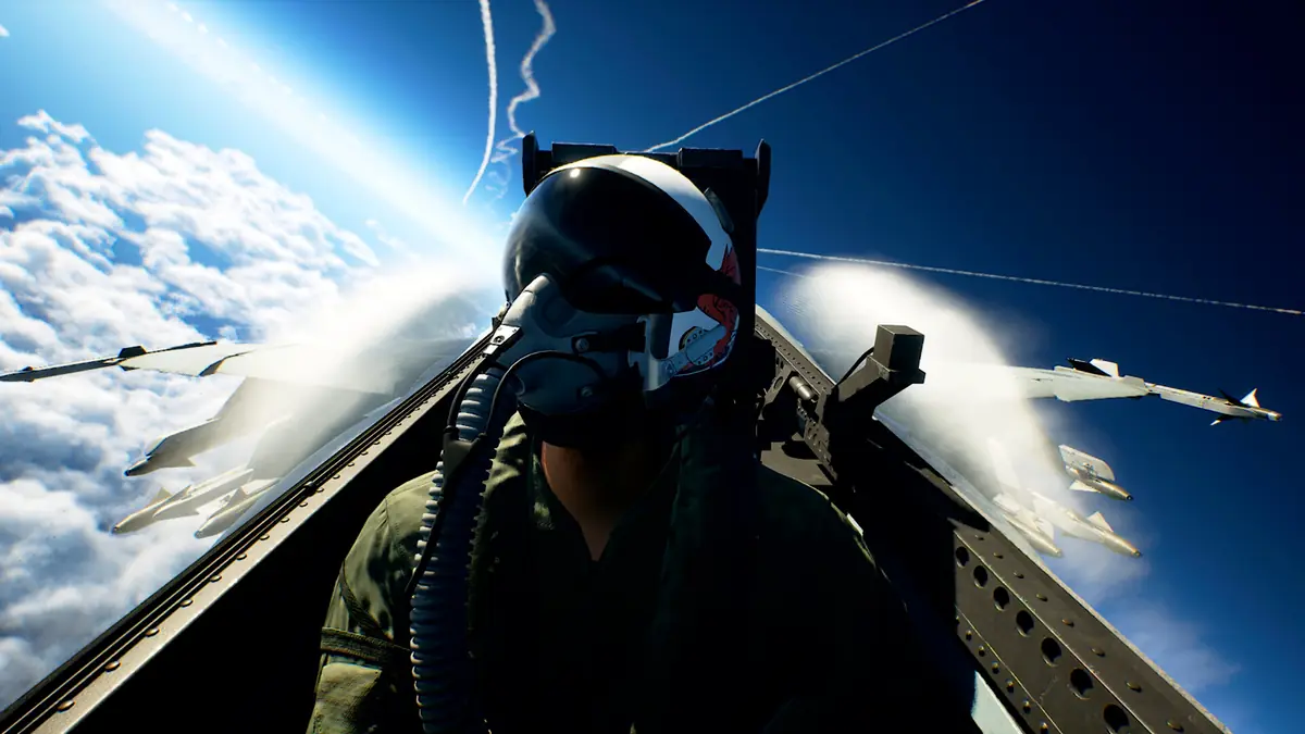 Official ACE COMBAT 8 screenshot looking out from inside the cockpit canopy at a bright sky
