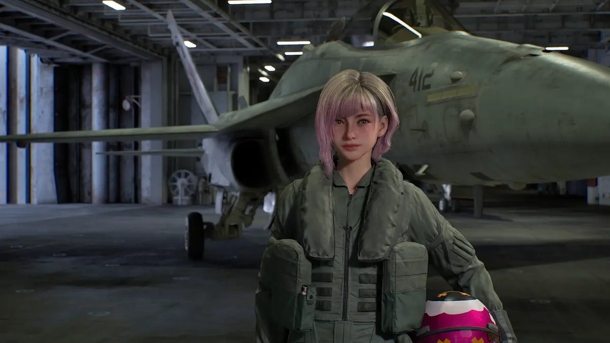 Official ACE COMBAT 8 screenshot of the pilot Tasha standing in a hangar in front of an aircraft in flight gear and survival equipment.