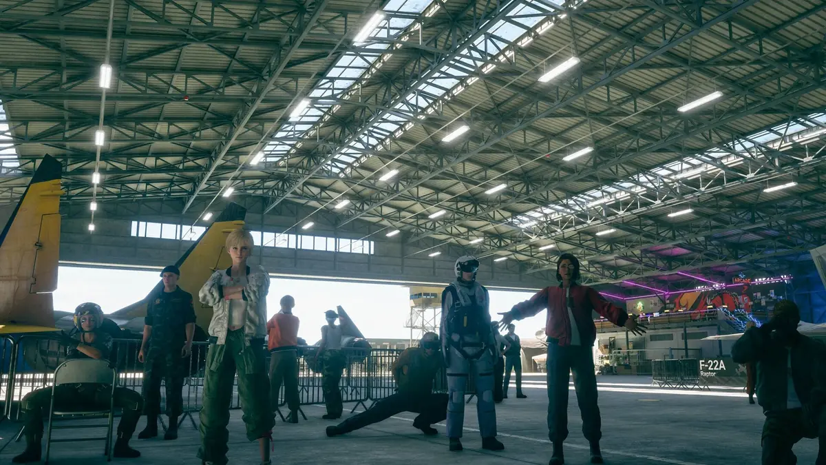 Official ACE COMBAT 8 screenshot of the squadron standing together in a hangar with an F-22A Raptor placard visible on the right.