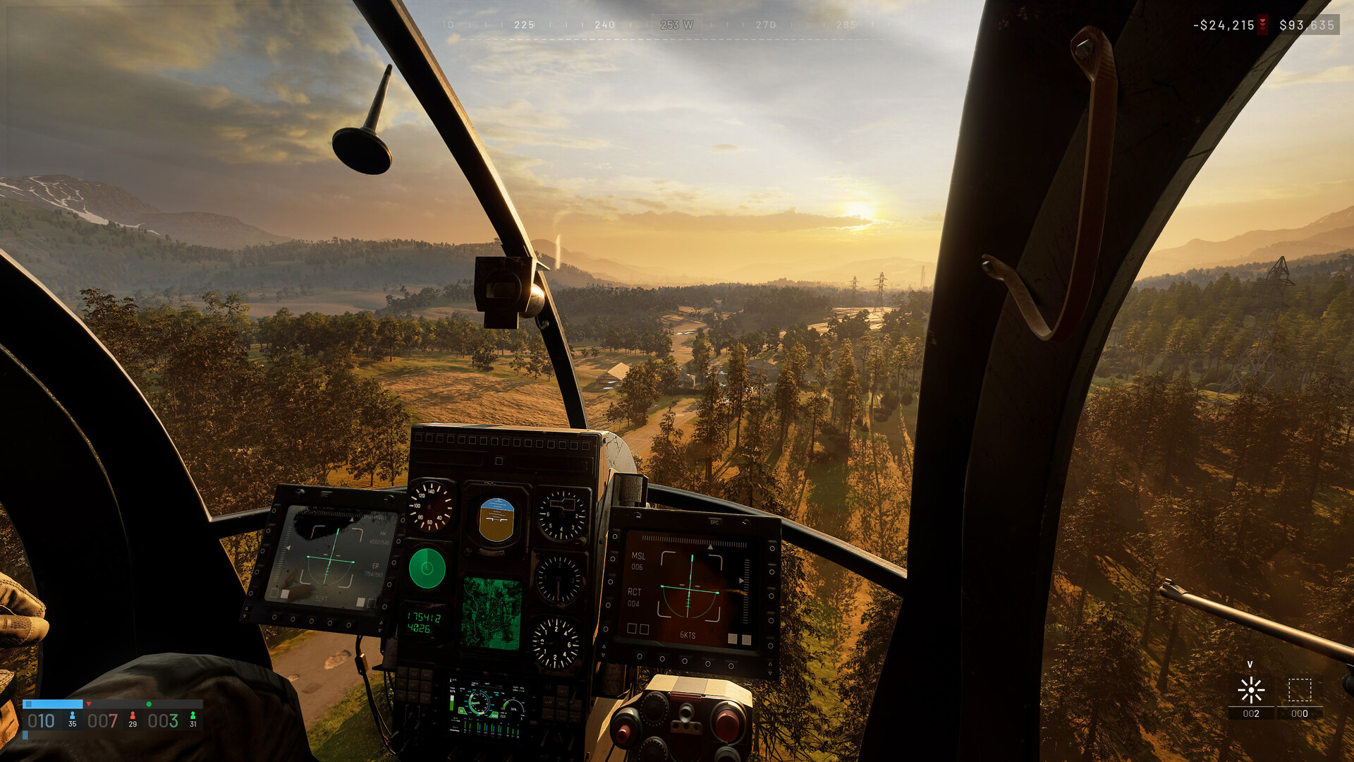 Official WARDOGS screenshot from inside a helicopter cockpit looking out over a forested valley at sunrise